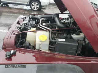 ✅ 2002 Jeep Wrangler Sport • VIN: 1J4FA49S92P722929 • Lot: 43842426. Listed on IAAI with 179,784 mi. Free auction sales archive from the USA and detailed vehicle history report at DreamBid. Image 12.