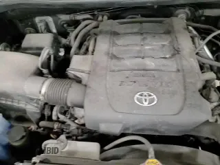 ✅ 2018 Toyota Tundra SR • VIN: 5TFUW5F15JX680970 • Lot: 93415815. Listed on Copart with 122,069 mi. Free auction sales archive from the USA and detailed vehicle history report at DreamBid. Image 13.