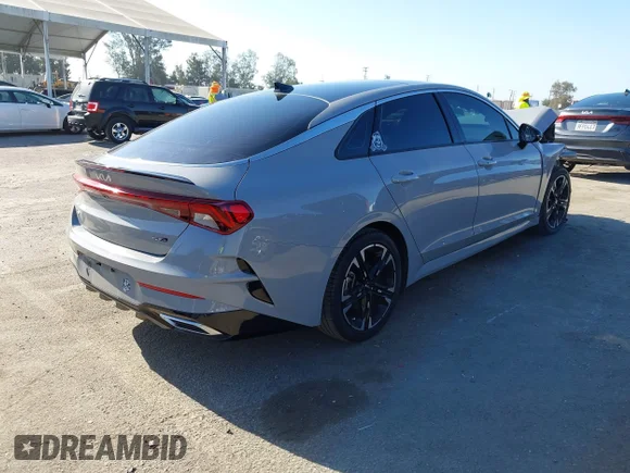 ✅ 2022 Kia K5 GT-Line • VIN: 5XXG64J2XNG121385 • Лот: 42487226. Опубліковано раніше на IAAI з пробігом 43 656 миль. Безкоштовний доступ до архіву аукціонних продажів зі США та докладний звіт про історію автомобіля на DreamBid. Зображення 4.