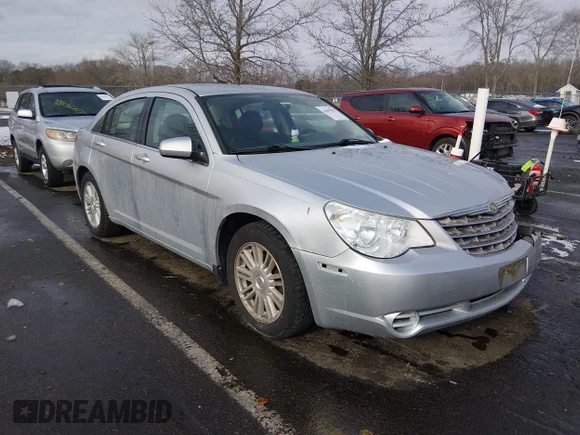 ✅ 2009 Chrysler Sebring Touring • VIN: 1C3LC56BX9N562065 • Lot: 44057987. Listed on IAAI with 91,400 mi. Free auction sales archive from the USA and detailed vehicle history report at DreamBid. Image 1.