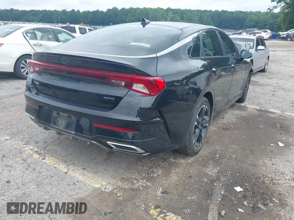 ✅ 2021 Kia K5 GT-Line • VIN: 5XXG64J25MG011018 • Лот: 42382147. Опубліковано раніше на IAAI з пробігом 87 600 миль. Безкоштовний доступ до архіву аукціонних продажів зі США та докладний звіт про історію автомобіля на DreamBid. Зображення 4.