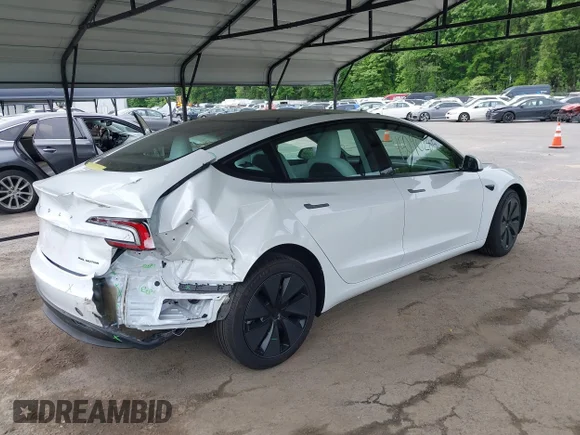 ✅ 2026 Tesla Model 3 Premium • VIN: 5YJ3E1EB3TF130116 • Lot: 45195081. Listed on IAAI with 6,545 mi. Free auction sales archive from the USA and detailed vehicle history report at DreamBid. Image 4.