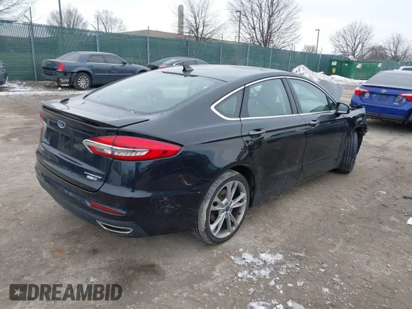 ✅ 2019 Ford Fusion Titanium • VIN: 3FA6P0D90KR120985 • Лот: 44228875. Опубликован ранее на IAAI с пробегом 77 202 миль. Бесплатный доступ к архиву аукционных продаж из США и подробный отчёт об истории автомобиля на DreamBid. Изображение 4.