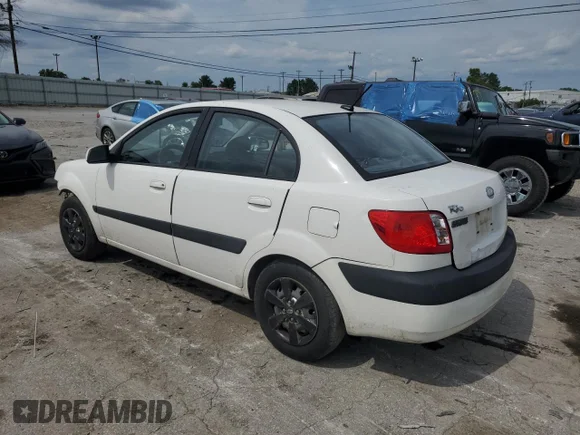 ✅ 2009 Kia Rio LX • VIN: KNADE223996526222 • Lot: 69976484. Wystawiony na Copart z przebiegiem 318 702 mil. Bezpłatny archiwum sprzedaży aukcyjnych z USA i szczegółowy raport historii pojazdu na DreamBid. Zdjęcie 2.