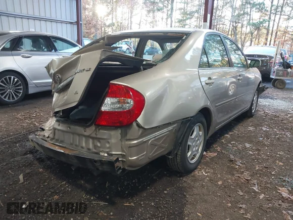 ✅ 2002 Toyota Camry LE • VIN: 4T1BF32K52U527952 • Lot: 43675852. Wystawiony na IAAI z przebiegiem 239 585 mil. Bezpłatny archiwum sprzedaży aukcyjnych z USA i szczegółowy raport historii pojazdu na DreamBid. Zdjęcie 4.
