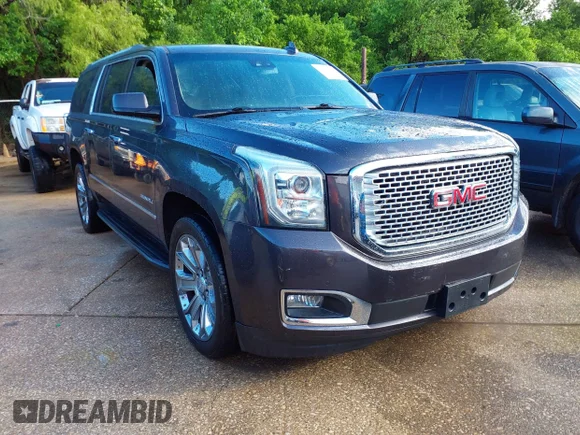 ✅ 2015 GMC Yukon XL Denali • VIN: 1GKS2JKJ5FR719302 • Лот: 42103612. Опубликован ранее на IAAI с пробегом Не указан. Бесплатный доступ к архиву аукционных продаж из США и подробный отчёт об истории автомобиля на DreamBid. Изображение 1.