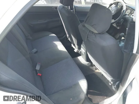 ✅ 2003 Mitsubishi Lancer LS • VIN: JA3AJ36E73U054672 • Лот: 42002271. Опубліковано раніше на IAAI з пробігом 263 568 миль. Безкоштовний доступ до архіву аукціонних продажів зі США та докладний звіт про історію автомобіля на DreamBid. Зображення 8.
