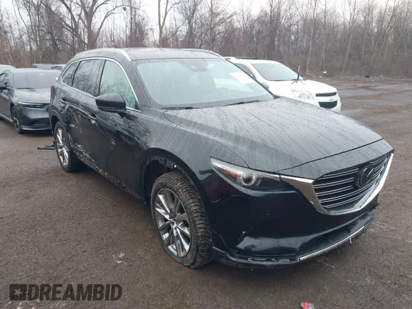 ✅ 2019 Mazda CX-9 Grand Touring • VIN: JM3TCBDY7K0330017 • Лот: 44518102. Опубликован ранее на IAAI с пробегом 61 274 миль. Бесплатный доступ к архиву аукционных продаж из США и подробный отчёт об истории автомобиля на DreamBid. Изображение 1.