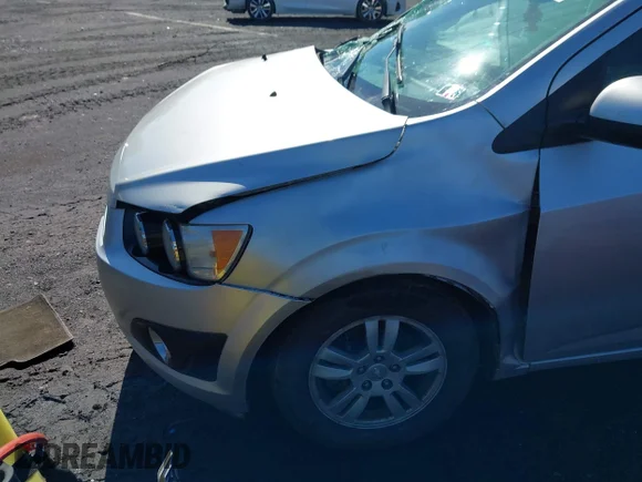 ✅ 2014 Chevrolet Sonic LT • VIN: 1G1JC5SG2E4201510 • Лот: 45048113. Опубліковано раніше на IAAI з пробігом 94 539 миль. Безкоштовний доступ до архіву аукціонних продажів зі США та докладний звіт про історію автомобіля на DreamBid. Зображення 6.