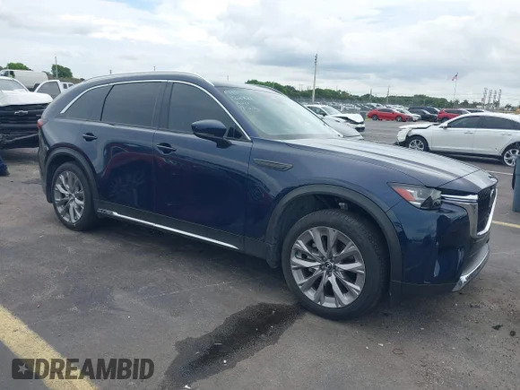 ✅ 2024 Mazda CX-90 Premium • VIN: JM3KKDHD2R1182221 • Lot: 45231637. Listed on IAAI with 18,997 mi. Free auction sales archive from the USA and detailed vehicle history report at DreamBid. Image 1.