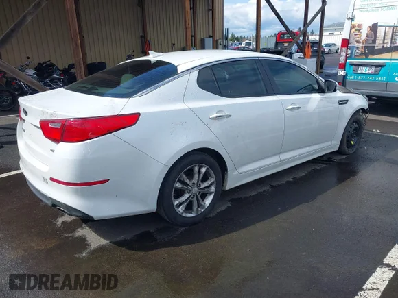 ✅ 2014 Kia Optima LX • VIN: 5XXGM4A73EG288026 • Лот: 41945117. Опубликован ранее на IAAI с пробегом 187 045 миль. Бесплатный доступ к архиву аукционных продаж из США и подробный отчёт об истории автомобиля на DreamBid. Изображение 4.