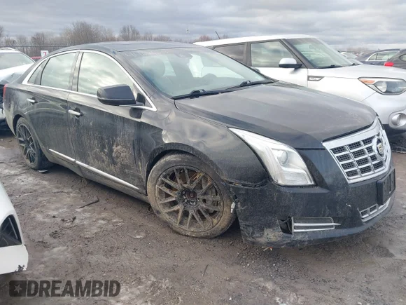 ✅ 2013 Cadillac XTS Premium • VIN: 2G61T5S3XD9100122 • Lot: 44014007. Wystawiony na IAAI z przebiegiem 236 100 mil. Bezpłatny archiwum sprzedaży aukcyjnych z USA i szczegółowy raport historii pojazdu na DreamBid. Zdjęcie 1.