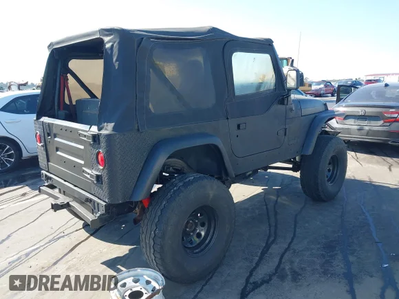 ✅ 1997 Jeep Wrangler SE • VIN: 1J4FY29P8VP477072 • Lot: 44359400. Wystawiony na IAAI z przebiegiem 133 536 mil. Bezpłatny archiwum sprzedaży aukcyjnych z USA i szczegółowy raport historii pojazdu na DreamBid. Zdjęcie 4.