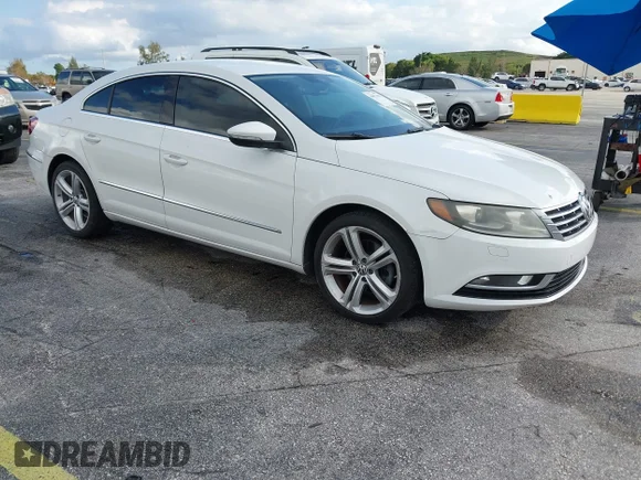 ✅ 2013 Volkswagen CC R-Line • VIN: WVWBN7AN9DE506545 • Lot: 44077399. Listed on IAAI with 157,018 mi. Free auction sales archive from the USA and detailed vehicle history report at DreamBid. Image 1.