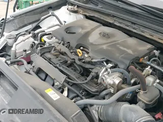 2023 Toyota Camry SE z VIN 4T1T11AK9PU800245, wystawiony jako IAAI lot #42989278 z przebiegiem 40 590 mil mil oraz . Historia ofert i sprzedaży dostępna na DreamBid. Obrazek 19.