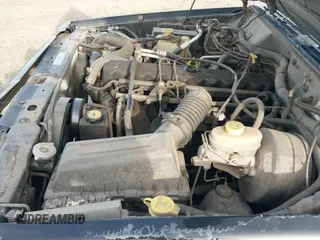 ✅ 1999 Jeep Cherokee Sport • VIN: 1J4FF67S3XL542845 • Lot: 43576296. Listed on IAAI with 248,139 mi. Free auction sales archive from the USA and detailed vehicle history report at DreamBid. Image 12.