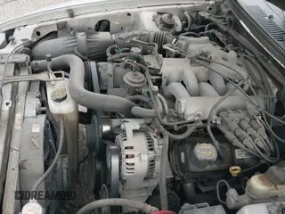 ✅ 2004 Ford Mustang Deluxe • VIN: 1FAFP44644F235487 • Lot: 42043136. Listed on IAAI with 164,875 mi. Free auction sales archive from the USA and detailed vehicle history report at DreamBid. Image 12.