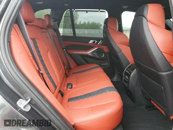 ✅ 2022 BMW X5 M • VIN: 5YMJU0C08N9K73041 • Lot: 50552535. Wystawiony na Copart z przebiegiem 27 715 mil. Bezpłatny archiwum sprzedaży aukcyjnych z USA i szczegółowy raport historii pojazdu na DreamBid. Zdjęcie 11.