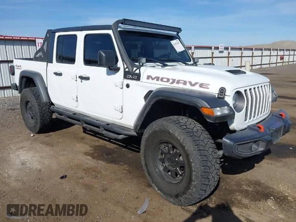 ✅ 2021 Jeep Gladiator Mojave • VIN: 1C6JJTEG2ML578573 • Lot: 42034265. Listed on IAAI with 30,141 mi. Free auction sales archive from the USA and detailed vehicle history report at DreamBid. Image 1.