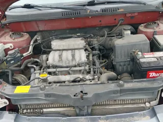 2002 Hyundai Santa Fe GLS z VIN KM8SC73D72U306997, wystawiony jako IAAI lot #41519773 z przebiegiem 244 398 mil mil oraz . Historia ofert i sprzedaży dostępna na DreamBid. Obrazek 17.