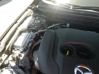 ✅ 2024 Mazda 3 Carbon Edition • VIN: 3MZBPBXY9RM407687 • Lot: 54621255. Listed on Copart with 31,786 mi. Free auction sales archive from the USA and detailed vehicle history report at DreamBid. Image 13.