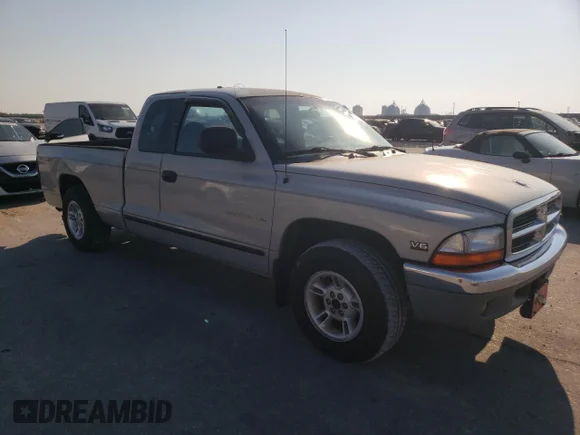 ✅ 1999 Dodge Dakota SLT • VIN: 1B7GL22X0XS315391 • Лот: 75209904. Опубліковано раніше на Copart з пробігом 181 336 миль. Безкоштовний доступ до архіву аукціонних продажів зі США та докладний звіт про історію автомобіля на DreamBid. Зображення 4.