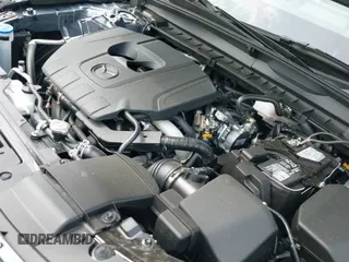 ✅ 2025 Mazda CX-50 S Premium • VIN: 7MMVABDM3SN359621 • Lot: 42402697. Listed on IAAI with 1,955 mi. Free auction sales archive from the USA and detailed vehicle history report at DreamBid. Image 19.