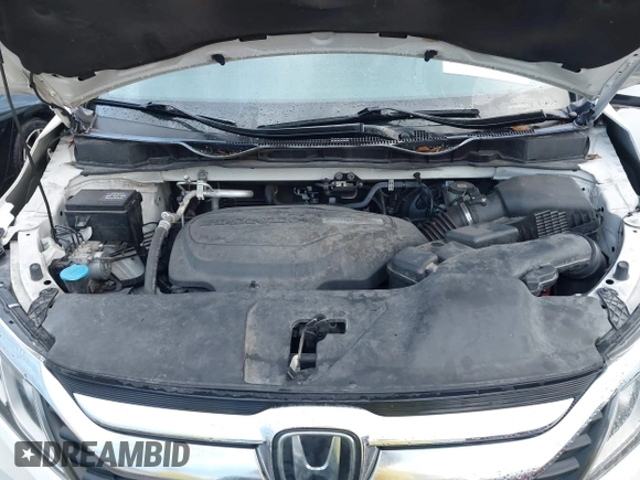 ✅ 2018 Honda Odyssey EX-L • VIN: 5FNRL6H73JB056343 • Lot: 44587522. Wystawiony na IAAI z przebiegiem 135 040 mil. Bezpłatny archiwum sprzedaży aukcyjnych z USA i szczegółowy raport historii pojazdu na DreamBid. Zdjęcie 10.