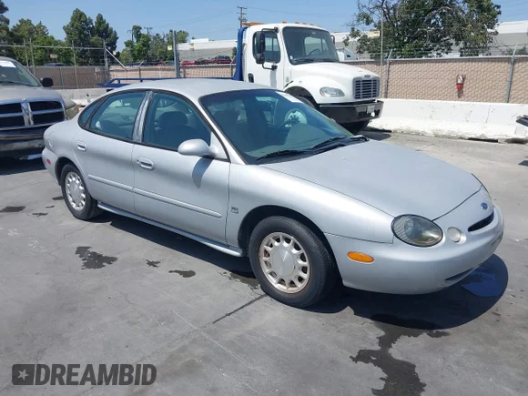 ✅ 1996 Ford Taurus LX • VIN: 1FALP53S5TG199843 • Lot: 42430761. Wystawiony na IAAI z przebiegiem 95 984 mil. Bezpłatny archiwum sprzedaży aukcyjnych z USA i szczegółowy raport historii pojazdu na DreamBid. Zdjęcie 1.