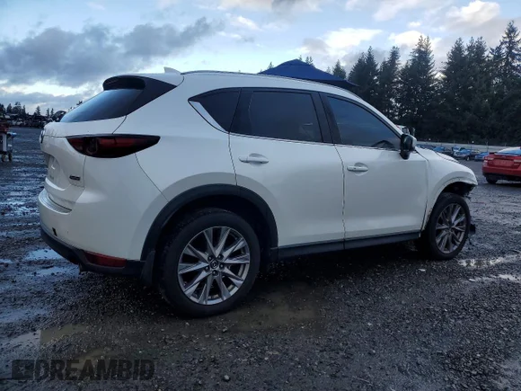 ✅ 2019 Mazda CX-5 Grand Touring • VIN: JM3KFBDMXK0519681 • Lot: 76913455. Listed on Copart with 113,340 mi. Free auction sales archive from the USA and detailed vehicle history report at DreamBid. Image 3.
