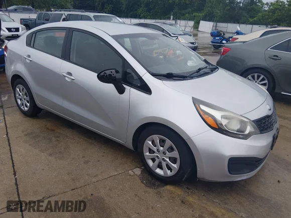 ✅ 2013 Kia Rio LX • VIN: KNADM4A35D6223639 • Lot: 45330391. Listed on IAAI with 124,069 mi. Free auction sales archive from the USA and detailed vehicle history report at DreamBid. Image 1.