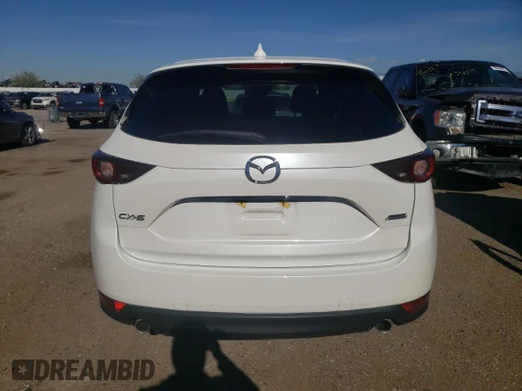 ✅ 2018 Mazda CX-5 Touring • VIN: JM3KFACM7J1346061 • Лот: 70636032. Опубліковано раніше на Copart з пробігом 32 141 миль. Безкоштовний доступ до архіву аукціонних продажів зі США та докладний звіт про історію автомобіля на DreamBid. Зображення 6.