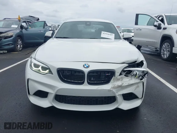 ✅ 2018 BMW M2 • VIN: WBS1J5C54J7B70016 • Lot: 42918582. Listed on IAAI with 63,869 mi. Free auction sales archive from the USA and detailed vehicle history report at DreamBid. Image 12.