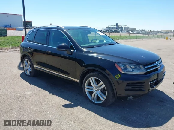 ✅ 2013 Volkswagen Touareg Sport • VIN: WVGEF9BP9DD007624 • Lot: 44966379. Wystawiony na IAAI z przebiegiem 151 813 mil. Bezpłatny archiwum sprzedaży aukcyjnych z USA i szczegółowy raport historii pojazdu na DreamBid. Zdjęcie 1.