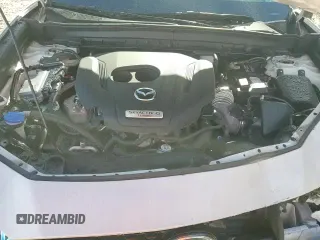 ✅ 2024 Mazda CX-30 Premium • VIN: 3MVDMBDY6RM692369 • Лот: 80347195. Опубликован ранее на Copart с пробегом 9 875 миль. Бесплатный доступ к архиву аукционных продаж из США и подробный отчёт об истории автомобиля на DreamBid. Изображение 16.