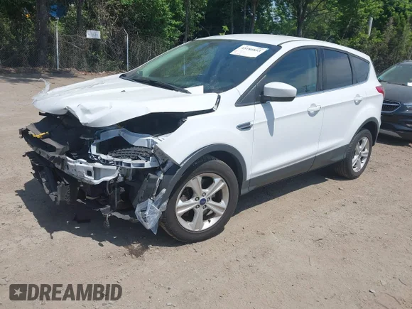 ✅ 2016 Ford Escape SE • VIN: 1FMCU9GX8GUC28948 • Лот: 45180853. Опубликован ранее на IAAI с пробегом 127 878 миль. Бесплатный доступ к архиву аукционных продаж из США и подробный отчёт об истории автомобиля на DreamBid. Изображение 2.