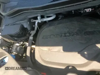 ✅ 2021 Honda Passport Touring • VIN: 5FNYF8H95MB029567 • Lot: 65695625. Listed on Copart with 36,336 mi. Free auction sales archive from the USA and detailed vehicle history report at DreamBid. Image 16.