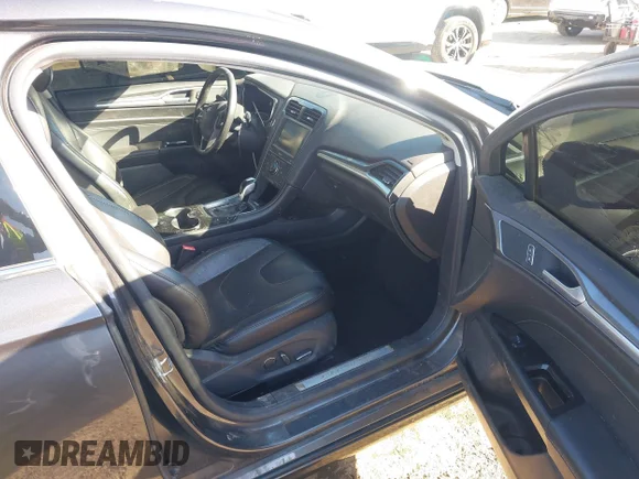 ✅ 2015 Ford Fusion Titanium • VIN: 3FA6P0SUXFR105942 • Lot: 44297137. Wystawiony na IAAI z przebiegiem 141 780 mil. Bezpłatny archiwum sprzedaży aukcyjnych z USA i szczegółowy raport historii pojazdu na DreamBid. Zdjęcie 5.