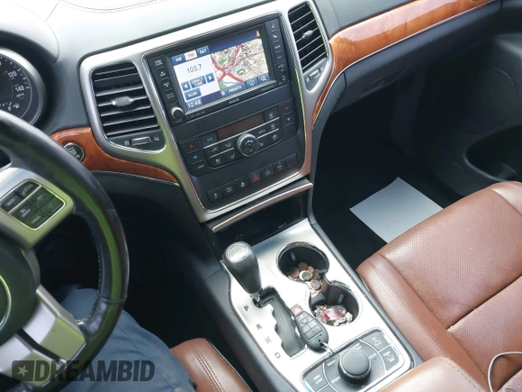 ✅ 2012 Jeep Grand Cherokee Overland • VIN: 1C4RJFCT1CC274727 • Lot: 43980571. Wystawiony na IAAI z przebiegiem 127 884 mil. Bezpłatny archiwum sprzedaży aukcyjnych z USA i szczegółowy raport historii pojazdu na DreamBid. Zdjęcie 11.
