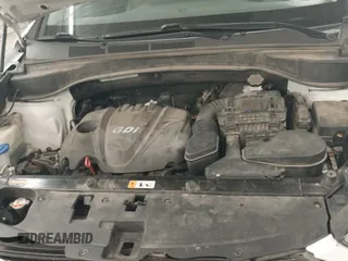 ✅ 2016 Hyundai Santa Fe • VIN: 5XYZUDLB5GG319835 • Лот: 43195919. Опубликован ранее на IAAI с пробегом 137 341 миль. Бесплатный доступ к архиву аукционных продаж из США и подробный отчёт об истории автомобиля на DreamBid. Изображение 21.