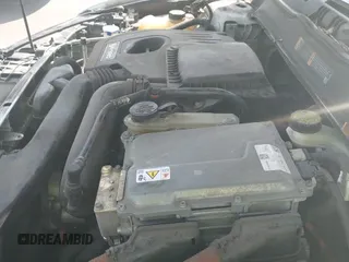 ✅ 2014 Ford Fusion Titanium Hybrid • VIN: 3FA6P0RU3ER278870 • Лот: 43112689. Опубликован ранее на IAAI с пробегом 141 643 миль. Бесплатный доступ к архиву аукционных продаж из США и подробный отчёт об истории автомобиля на DreamBid. Изображение 16.