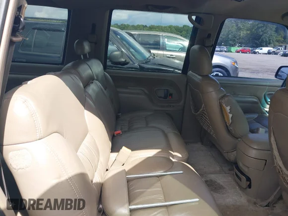 ✅ 1999 GMC Suburban • VIN: 3GKEC16R0XG547353 • Lot: 40426884. Wystawiony na IAAI z przebiegiem 284 689 mil. Bezpłatny archiwum sprzedaży aukcyjnych z USA i szczegółowy raport historii pojazdu na DreamBid. Zdjęcie 8.