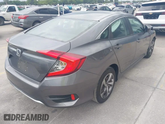 ✅ 2020 Honda Civic LX • VIN: 19XFC2F63LE005584 • Lot: 45239299. Wystawiony na IAAI z przebiegiem 91 989 mil. Bezpłatny archiwum sprzedaży aukcyjnych z USA i szczegółowy raport historii pojazdu na DreamBid. Zdjęcie 4.