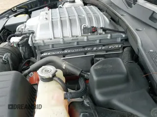 2022 Dodge Charger SRT Hellcat Widebody z VIN 2C3CDXL99NH199819, wystawiony jako IAAI lot #43450586 z przebiegiem 21 491 mil mil oraz . Historia ofert i sprzedaży dostępna na DreamBid. Obrazek 19.