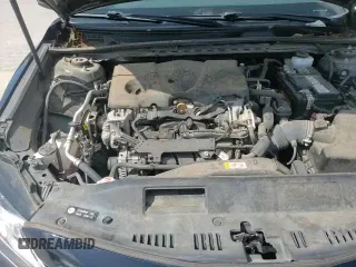 2019 Toyota Camry LE z VIN 4T1B11HK0KU794720, wystawiony jako Copart lot #66700455 z przebiegiem 102 818 mil mil oraz Czysty tytuł • Clean title. Historia ofert i sprzedaży dostępna na DreamBid. Obrazek 13.