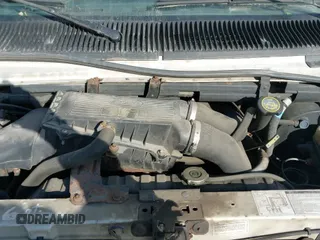 ✅ 1996 Ford Econoline Wagon XL • VIN: 1FBJS31HXTHB03215 • Lot: 41650649. Wystawiony na IAAI z przebiegiem 192 934 mil. Bezpłatny archiwum sprzedaży aukcyjnych z USA i szczegółowy raport historii pojazdu na DreamBid. Zdjęcie 13.