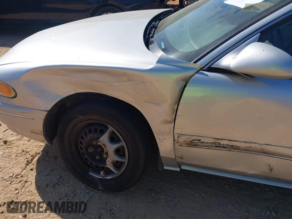 ✅ 2001 Buick Century Custom • VIN: 2G4WS52J411238362 • Lot: 44878195. Wystawiony na IAAI z przebiegiem 112 418 mil. Bezpłatny archiwum sprzedaży aukcyjnych z USA i szczegółowy raport historii pojazdu na DreamBid. Zdjęcie 6.