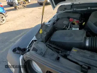 ✅ 2021 Jeep Wrangler Islander • VIN: 1C4GJXAN1MW796596 • Lot: 82639565. Wystawiony na Copart z przebiegiem 75 671 mil. Bezpłatny archiwum sprzedaży aukcyjnych z USA i szczegółowy raport historii pojazdu na DreamBid. Zdjęcie 14.