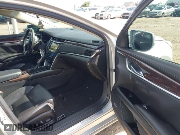 ✅ 2015 Cadillac XTS Luxury • VIN: 2G61N5S36F9251701 • Лот: 40315224. Опубликован ранее на IAAI с пробегом 99 918 миль. Бесплатный доступ к архиву аукционных продаж из США и подробный отчёт об истории автомобиля на DreamBid. Изображение 5.
