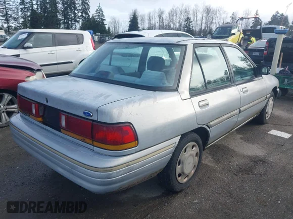 ✅ 1994 Ford Escort • VIN: 3FARP13J7RR154091 • Lot: 41765286. Listed on IAAI with 86,247 mi. Free auction sales archive from the USA and detailed vehicle history report at DreamBid. Image 4.